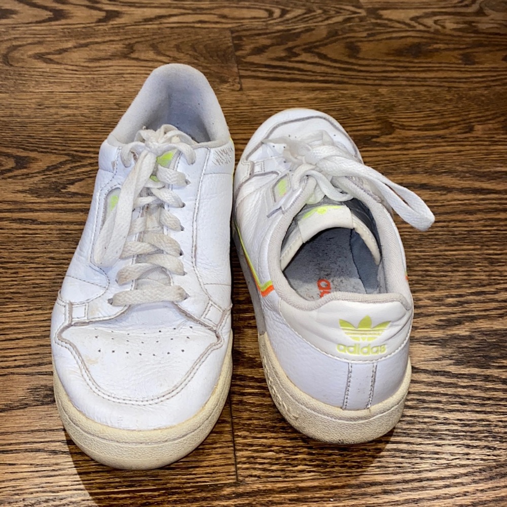 White and neon Adidas sneakers